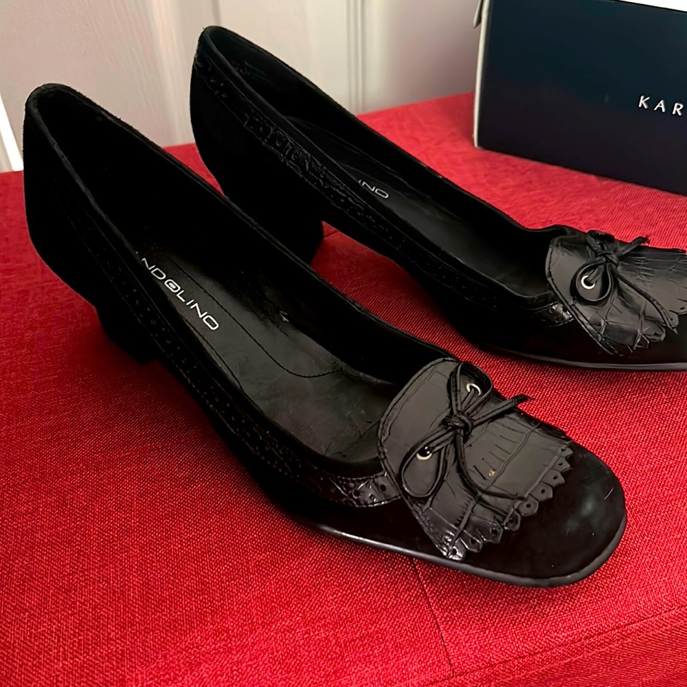 Black low heeled suede and leather shoe